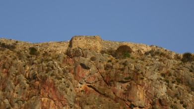 Soft morning light, stone wall of an old fortress on top of a rock, Monemvasia, Monemvassia,