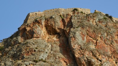 Dramatic rock formation rising against blue sky, Monemvasia, Monemvassia, Malvasy, Byzantine small