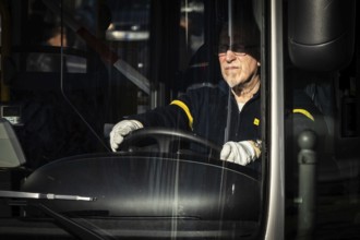 DEU Germany Germany Berlin BVG bus driver wears white gloves to protect against corona. Due to the