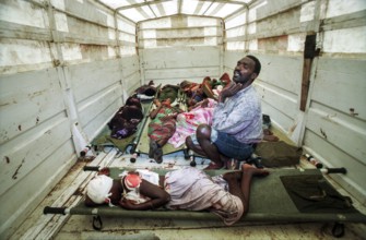 RWA Rwanda Kigali Injured Tutsi refugees who fled to the sports stadium are waiting for treatment