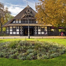 Entrance to Dahlem-Dorf subway station, thatched half-timbered house in the style of a North German