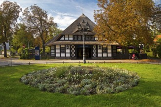 Entrance to Dahlem-Dorf subway station, thatched half-timbered house in the style of a North German