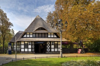 Entrance to Dahlem-Dorf subway station, thatched half-timbered house in the style of a North German