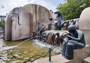 Weltkugelbrunnen with turner in the foreground, also known as Schmettau Fountain or Wasserklops, by