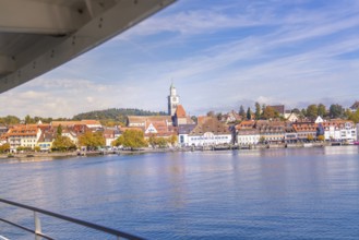 Panorama of a picturesque coastal town in sunny weather, boat trip, Lake Constance, Germany