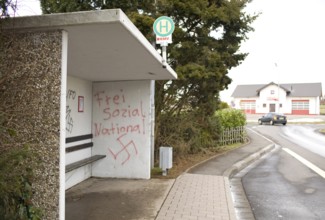 DEU Caan National Socialist graffiti on the wall of a bus stop in Caan, a village near the city of