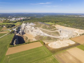 View of a large quarry with surrounding fields and forests, Nagold, Black Forest, Germany
