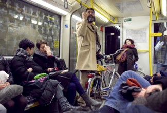 DEU Berlin passengers on the U8 towards Hermannplatz Saturday night. Germany Berlin Passengers