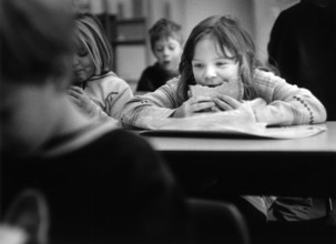 DEU, Meudt, 07.04.2000 -- Student eating lunch in class. -- Â© Karsten Thielker