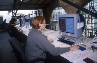 DEU, Berlin, 23.08.99 - Working on a computer at the Scholz and Friends advertising agency. ©