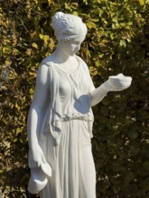 Statue of in Greek mythology goddess of youth Hebe Roman goddess Iuventas of male youth holding a