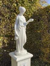 Statue of in Greek mythology goddess of youth Hebe Roman goddess Iuventas of male youth holding a