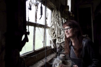Germany JAMEL Mrs. Lohmeyer looks out of her barn