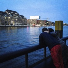 DEU Germany Germany Berlin A couple on the banks of Watergate, a club on the Oberbaum Bridge