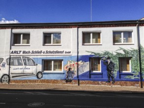 DEU Germany Germany Leipzig Wall painting as an advertisement for a security company in Leipzig