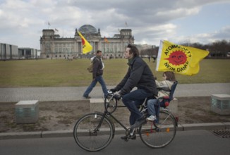 Germany Berlin Anti-nuclear power demonstration in Berlin Mitte. Demonstrators pass the Reichstag