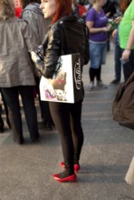 DEU Berlin woman with red shoes on Rosenthaler Straße in Berlin Mitte Germany Berlin Woman in red