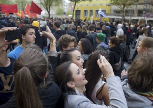 GERMANY Tourists are filming the May 1st rally on Köpenicker Straße. Germany Berlin Tourists