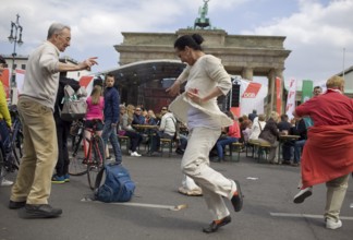 GERMANY Dancers at the DGB rally in front of the Brandenburg Gate Germany Berlin People dance in
