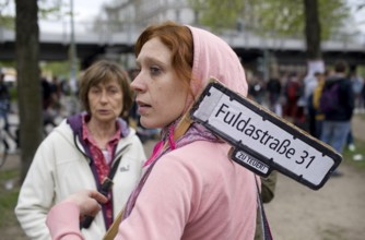 GERMANY A woman with a sign of protest at the May 1 rally in Kreuzberg. Germany Berlin A woman