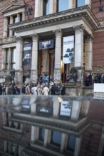 DEU Germany Germany Berlin Visitors wait in front of the Martin-Gropius-Bau for admission to the