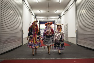 DEU Germany Germany Berlin International Tourism Exchange ITB. South American hostesses walk