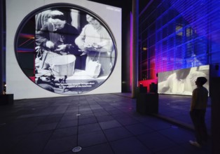 Open-air cinema on German history at Marie-Elisabeth-Lüders-Haus with the river Spree in the
