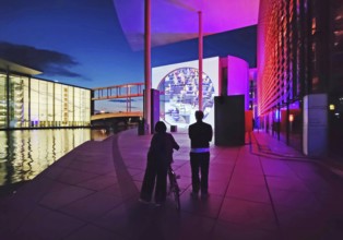 Open-air cinema on German history at Marie-Elisabeth-Lüders-Haus with the river Spree in the