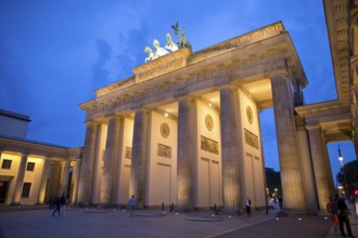 Illuminated Brandenburg Gate in the evening, Berlin, Germany