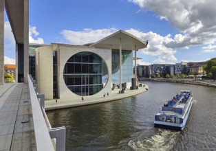 Marie-Elisabeth-Lüders-Haus with the river Spree and sightseeing boat, government district,