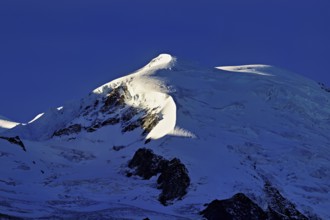 Snow-capped Dome du Goûter, Chamonix-Mont-Blanc, Haute-Savoie, France