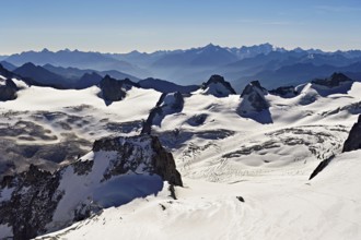 View of the snow-capped mountains from the Aiguille du Midi mountain station observation deck,
