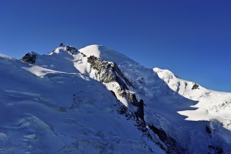 Snowy from left, Mont Maudit, Mont-Blanc, Aiguille du Midi mountain station viewing platform,
