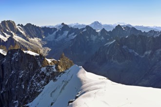View from the Aiguille du Midi mountain station observation deck of the mountains Les Droites, Les