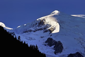 Snow-capped Dome du Goûter, Chamonix-Mont-Blanc, Haute-Savoie, France
