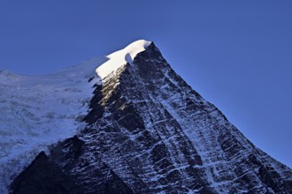 Snow-covered Aiguille du Goutier, Chamonix-Mont-Blanc, Haute-Savoie, France