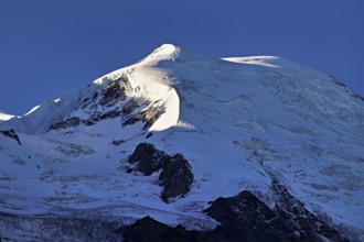 Snow-capped Dome du Goûter, Chamonix-Mont-Blanc, Haute-Savoie, France