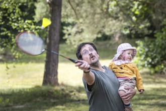 DEU Germany Germany Berlin HZB summer party at the Wannsee site. Father plays badminton with