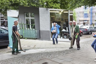 DEU Germany Germany Berlin A local resident looks at himself in a huge mirror that is being