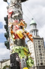DEU Germany Germany Berlin note with advertisements at a traffic light at Frankfurter Tor in