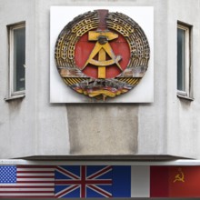 Old building of the Wall Museum — Museum Haus am Checkpoint Charlie with the old coat of arms of