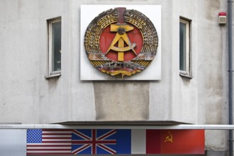 Old building of the Wall Museum — Museum Haus am Checkpoint Charlie with the old coat of arms of