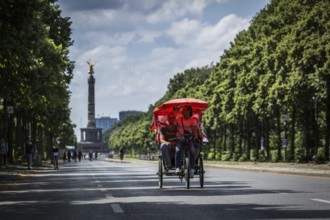 DEU Germany Germany Berlin rickshaw driver on June 17 street in Berlin, which is blocked during the