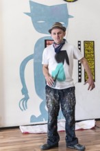 DEU Germany Germany Berlin The artist Jim Avignon setting up an exhibition at the 'Retram' gallery