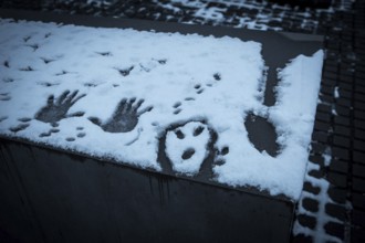 DEU Germany Germany Berlin Messages immortalized in snow from visitors to the Holocaust Memorial in