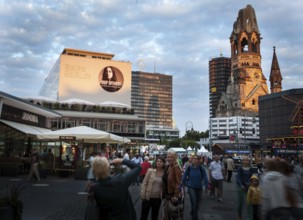 DEU Germany Germany Berlin The new bikini house and memorial church are illuminated by warm evening