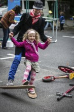 DEU Germany Germany Berlin Children play on Gudvanger Straße, which has been declared the city's