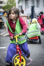 DEU Germany Germany Berlin Children play on Gudvanger Straße, which has been declared the city's