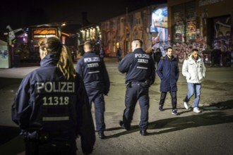 DEU Germany Germany Berlin scene on the RAW site in Berlin-Friedrichsain. Police tour