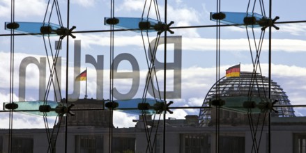 View from the main train station with the inverted Berlin lettering on the glass façade and the